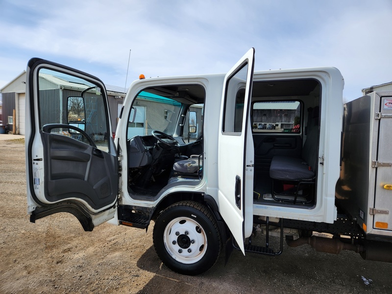 Landscape & Construction  We Finance All Types of Credit! - 2015 Isuzu NPR-HD Dump Truck Photo