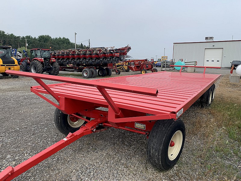 2019 CREEKBANK 25 FOOT HAY RACK ON HORST 265 WAGON GEAR