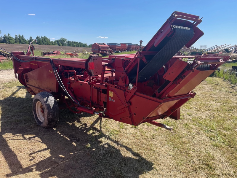 Hay/Forage/Livestock  New Holland 310 Square Baler with Thrower Photo