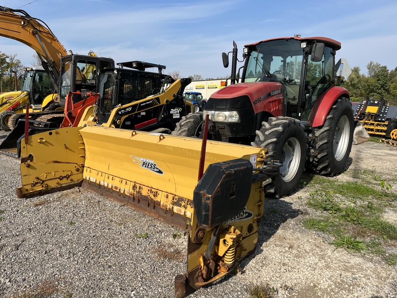 Case 105C Tractor with Metal Pless Plow 