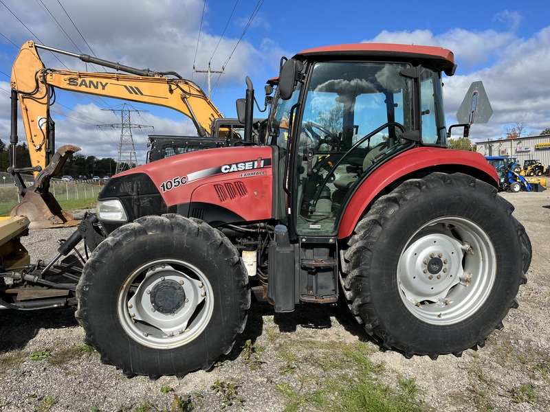 Case 105C Tractor with Metal Pless Plow 