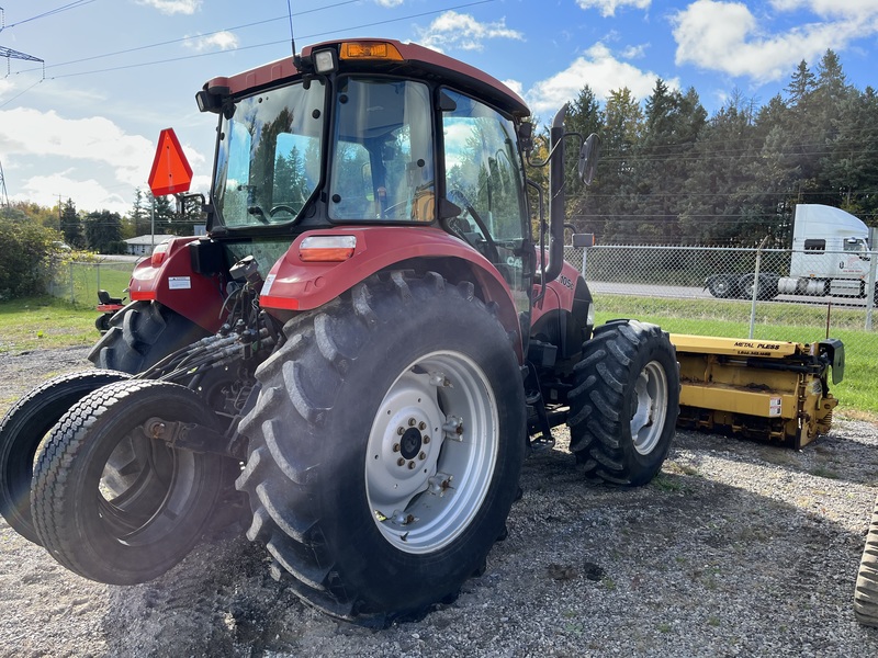 Case 105C Tractor with Metal Pless Plow 