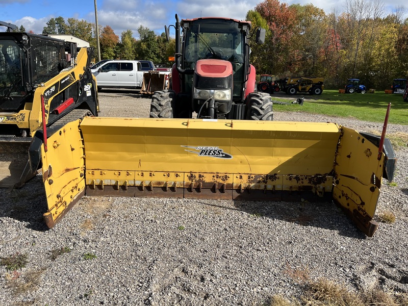 Case 105C Tractor with Metal Pless Plow 