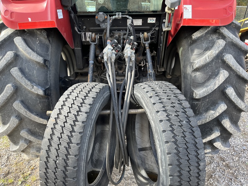 Case 105C Tractor with Metal Pless Plow 