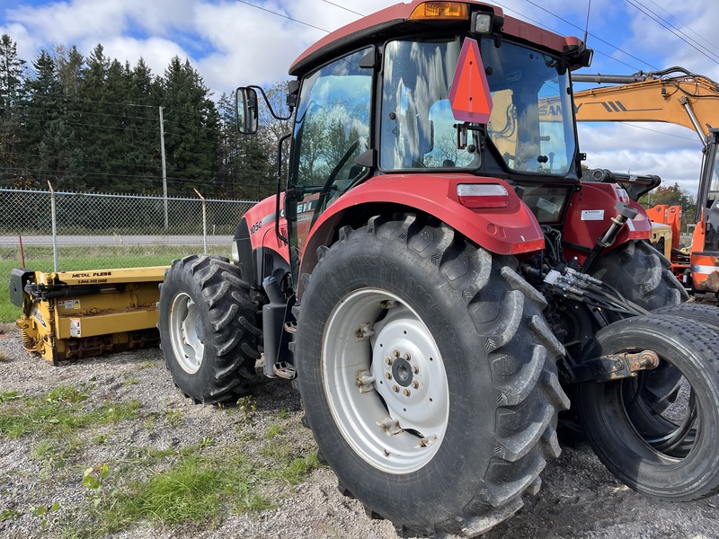 Case 105C Tractor with Metal Pless Plow 