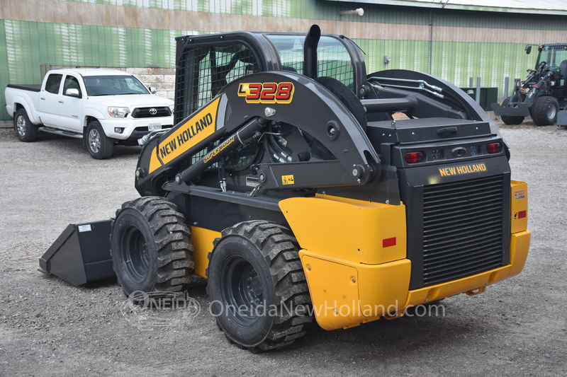 Skidsteers & Track Loaders  New Holland L328 Skidsteer Photo