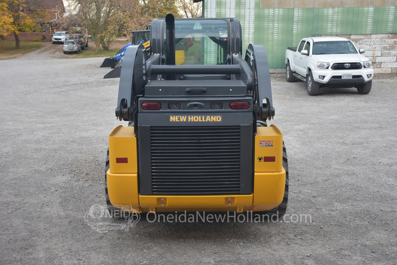 Skidsteers & Track Loaders  New Holland L328 Skidsteer Photo